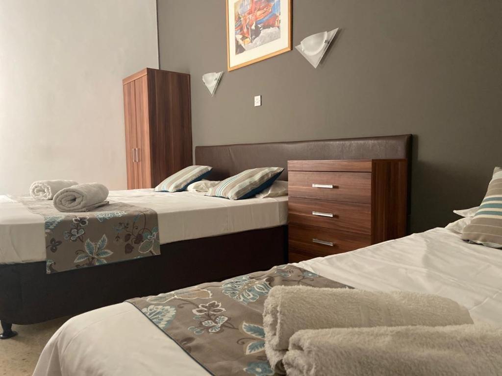 Sunstone Boutique Guest House Buġibba Esterno foto